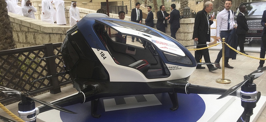 A model of EHang 184 and the next generation of Dubai Drone Taxi is seen during the second day of the World Government Summit in Dubai, United Arab Emirates, Monday, Feb. 13, 2017.