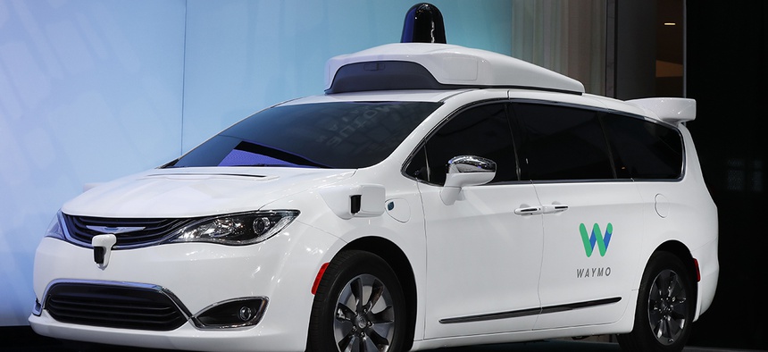 A Chrysler Pacifica hybrid outfitted with Waymo's suite of sensors and radar is shown at the North American International Auto Show in Detroit, Sunday, Jan. 8, 2017.