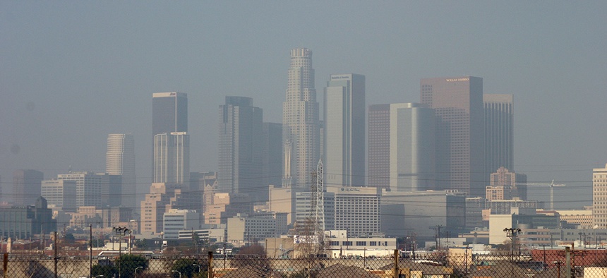 A view of downtown Los Angeles, California covered in smog.
