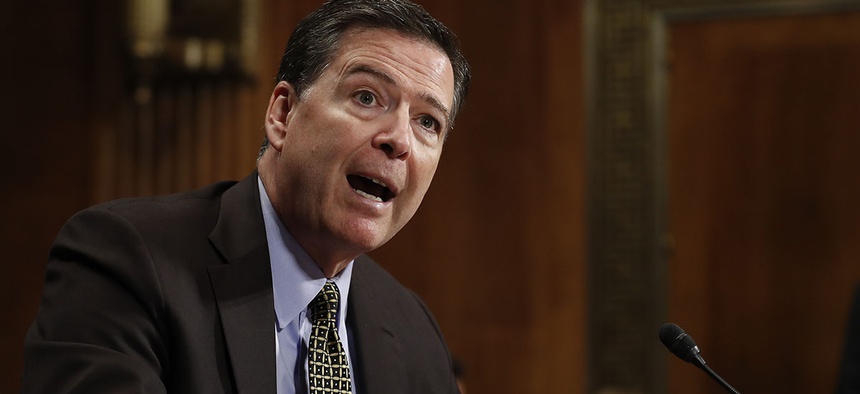 FBI Director James Comey testifies on Capitol Hill.