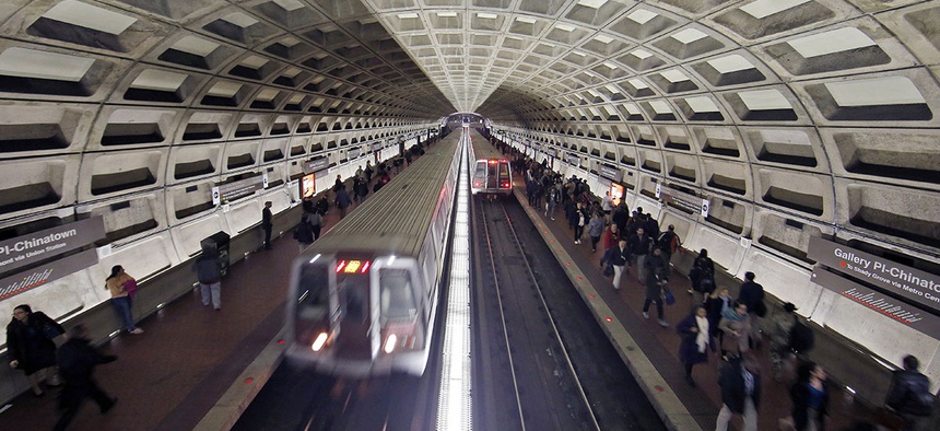 Metro trains arrive in the Gallery Place-Chinatown Metro station in Washington, DC.