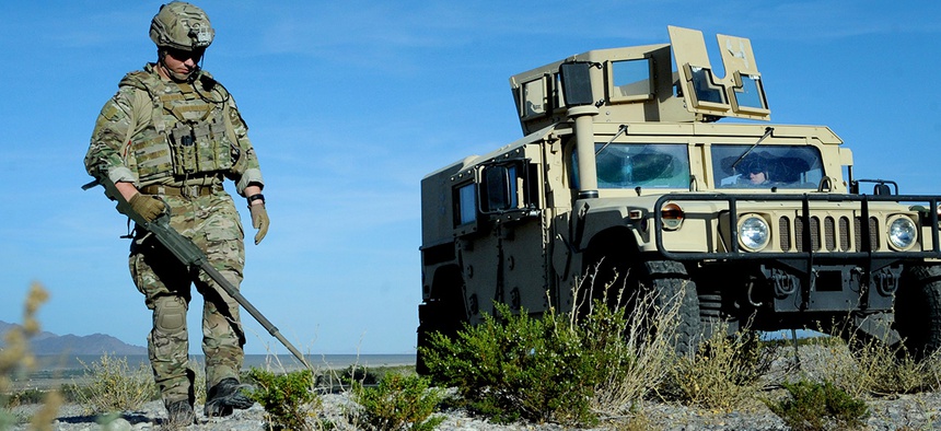Tech Sgt. Nathaniel Jackson, 99th Civil Engineer Squadron explosive ordnance disposal technician, begins a roadside bomb clearing operation during a training event June 7, 2017 at the Nevada Test and Training Range.