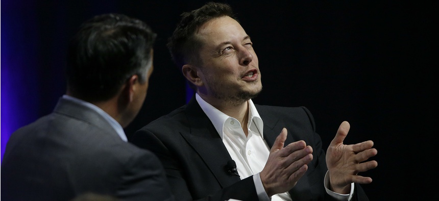 Tesla and SpaceX CEO Elon Musk with Nevada Republican Gov. Brian Sandoval at the National Governors Association's meeting July 15.