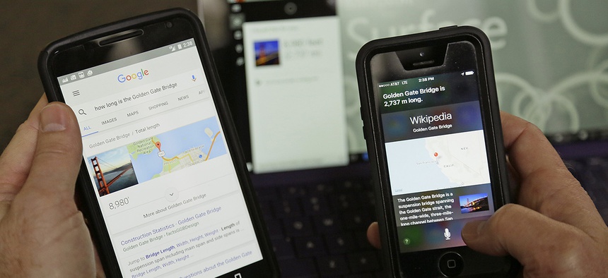 The Google, Cortana and Siri digital assistants on display.