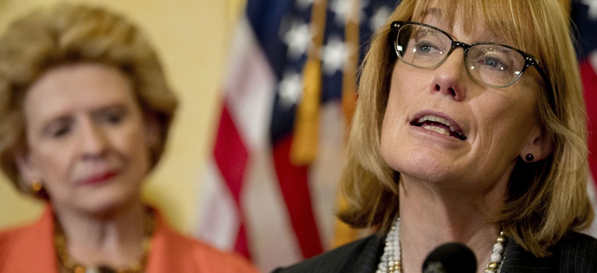 Sen. Maggie Hassan, D-N.H., right.