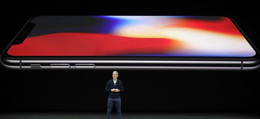 Apple CEO Tim Cook announces the new iPhone X at the Steve Jobs Theater on the new Apple campus, Tuesday, Sept. 12, 2017.