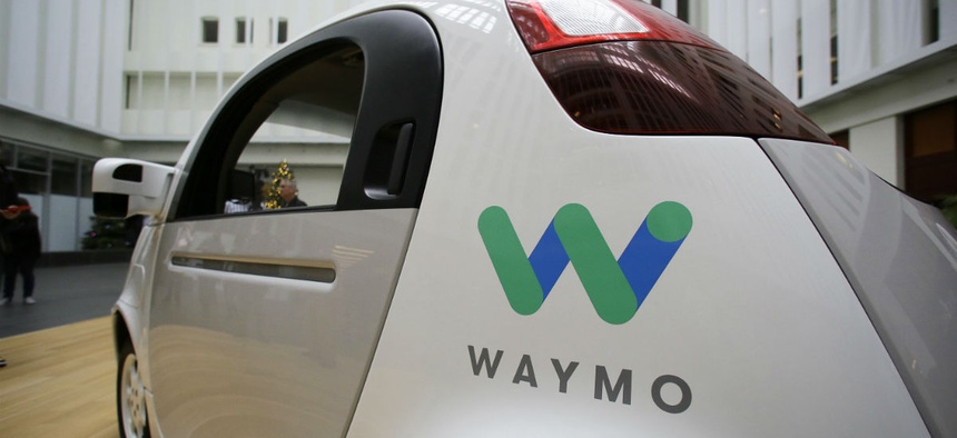 The Waymo driverless car is displayed during a Google event, in San Francisco.