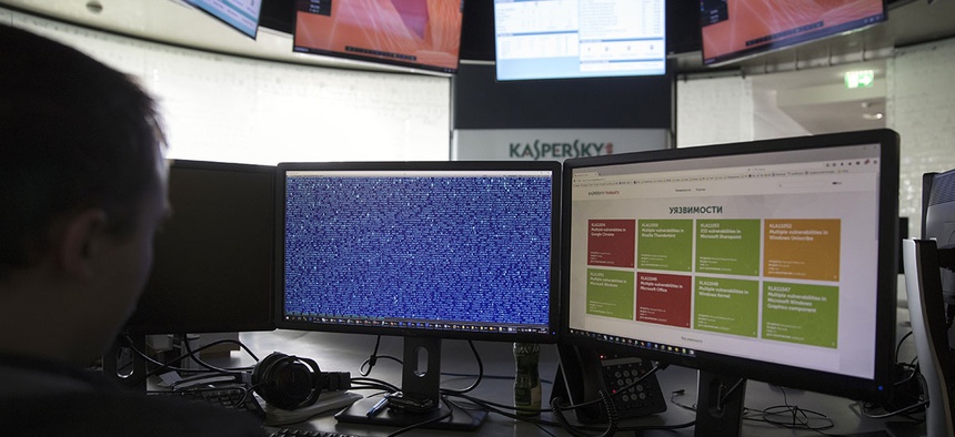 An employee of Kaspersky Lab works on computers at the company's headquarters in Moscow, Russia, Saturday, July 1, 2017.