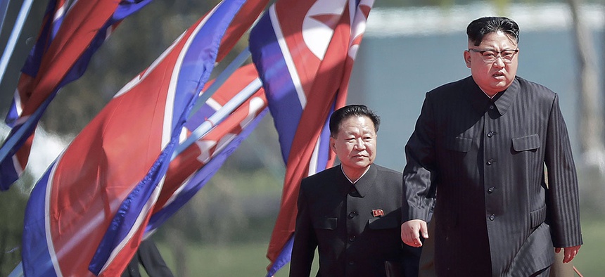 North Korean leader Kim Jong Un, right, and Choe Ryong Hae, vice-chairman of the central committee of the Workers' Party, arrive for the official opening of the Ryomyong residential area, Thursday, April 13, 2017, in Pyongyang, North Korea.