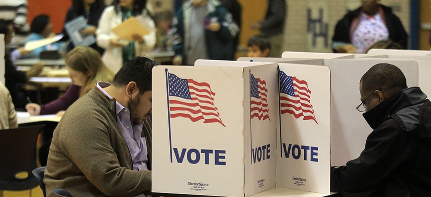 Voters fill out their ballots in northern Virginia during the 2016 election.
