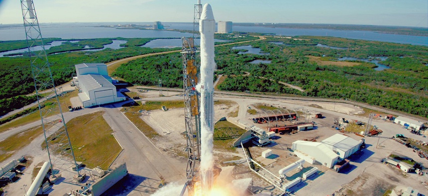 The SpaceX Falcon 9 rocket with the Dragon spacecraft launches from Space Launch Complex 40 at Cape Canaveral, Fla., on Friday, Dec. 15, 2017.