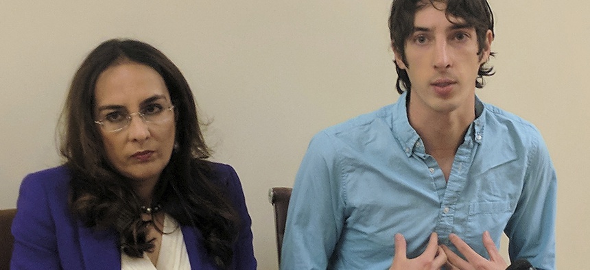 James Damore, right, a former Google engineer fired in 2017, speaks at a news conference while his attorney, Harmeet Dhillon, listens, Monday, Jan. 8, 2018, in San Francisco.