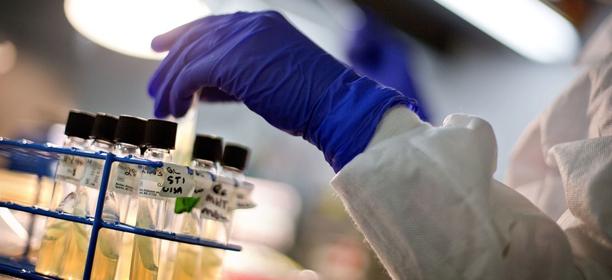 A microbiologist works with tubes of bacteria samples in an antimicrobial resistance and characterization lab within the Infectious Disease Laboratory at the Centers for Disease Control and Prevention in Atlanta.