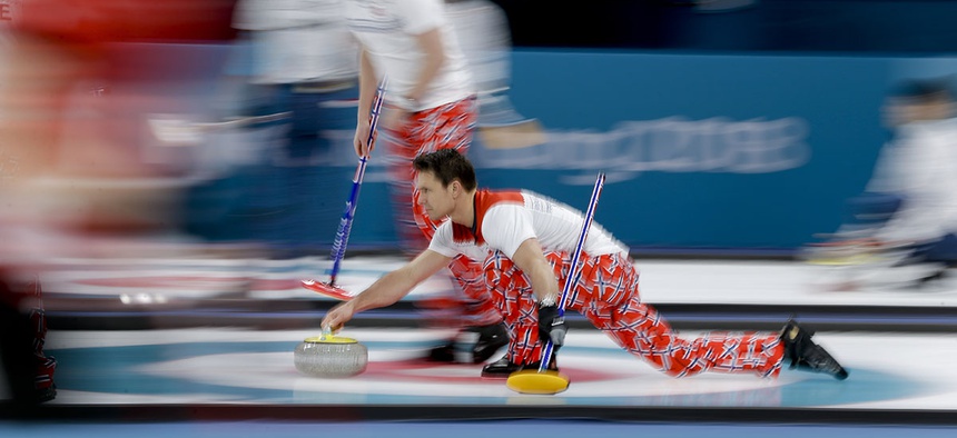 Norway's skip Thomas Ulsrud throw a stone during a men's curling match against Sweden at the 2018 Winter Olympics in Gangneung, South Korea.