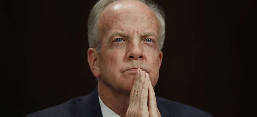Sen. Jerry Moran, R-Kan., pauses before testifying during a Senate Judiciary Committee hearing.