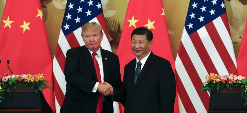 President Donald Trump and Chinese President Xi Jinping at the Great Hall of the People in Beijing, November 9.
