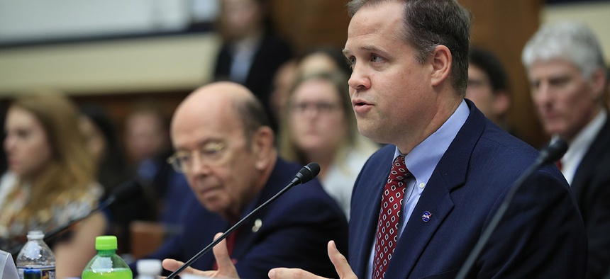 NASA Administrator Jim Bridenstine with Commerce Secretary Wilbur Ross, left, testifies before Congress.
