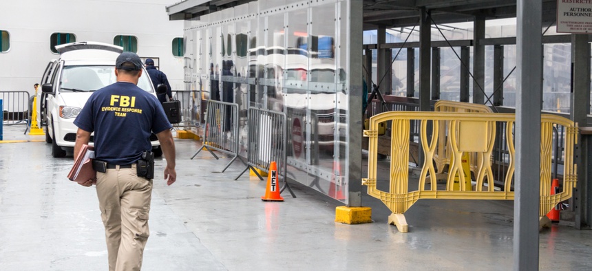 An FBI officer goes inside the Emerald Princess Cruise Ship docked in Juneau, Alaska, to investigate a crime.