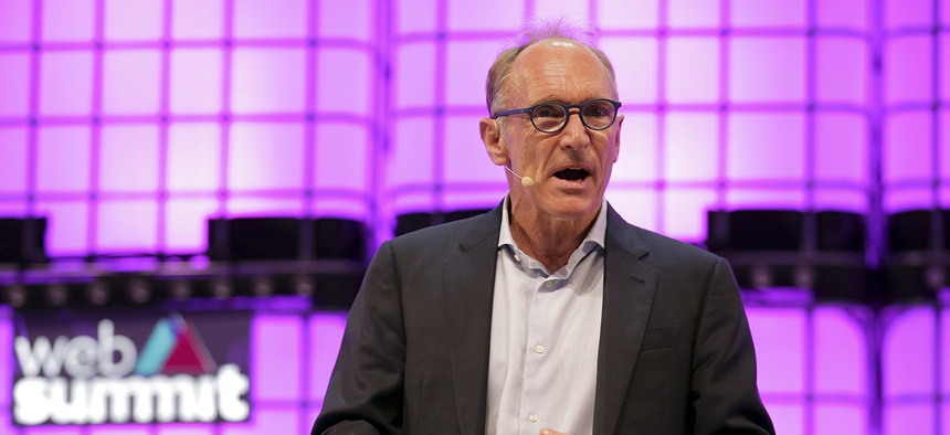 Tim Berners-Lee, known as the inventor of the World Wide Web, addresses the attendees during the opening of the Web Summit technology conference in Lisbon, Monday, Nov. 5 2018.