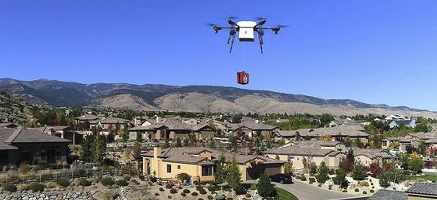 A Flirtey, Nev., delivery drone demonstrates the delivery of a defibrillator for cardiac arrest patients in Reno.