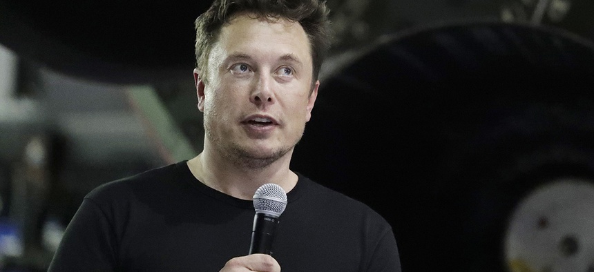 SpaceX founder and chief executive Elon Musk speaks after announcing Japanese billionaire Yusaku Maezawa as the first private passenger on a trip around the moon in Hawthorne, Calif.