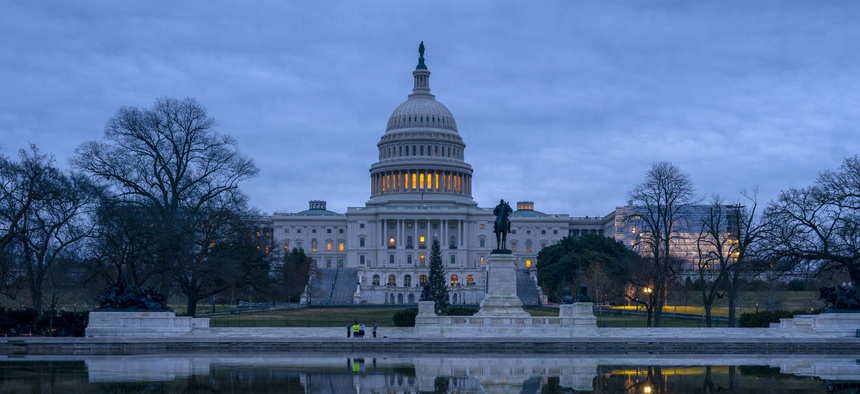 The Capitol is seen under early morning skies in Washington, Thursday, Dec. 20, 2018.
