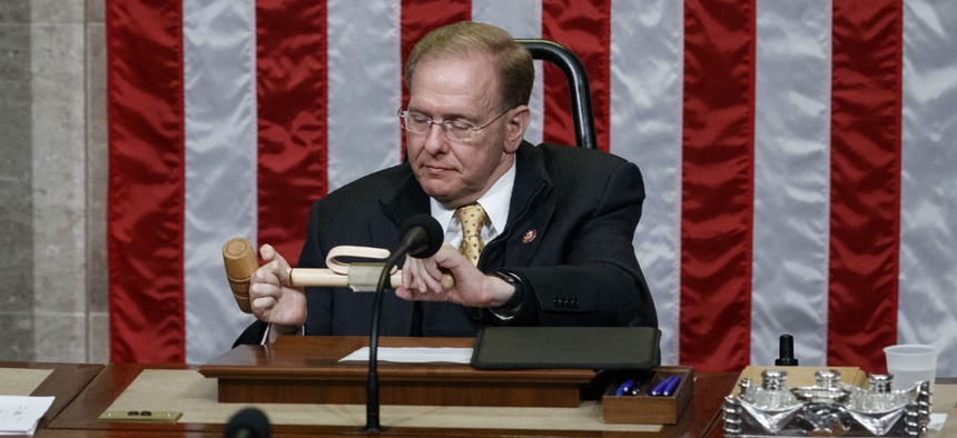 Rep. Jim Langevin prepares the dais after he was chosen as Speaker pro tempore for the opening day of the 116th Congress Jan. 3.