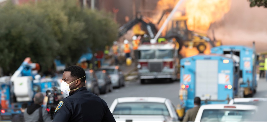 Firefighters battle a gas main blaze on Geary Blvd in San Francisco's Richmond District in February.