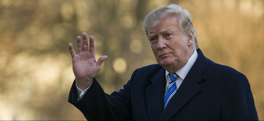 President Donald Trump waves as he walks on the South Lawn after stepping off Marine One at the White House, Sunday, March 10, 2019, in Washington.