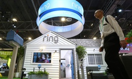 Amazon-owned Ring shows off new products at a booth complete with home and yard during the CES tech show Jan. 7 in Las Vegas.