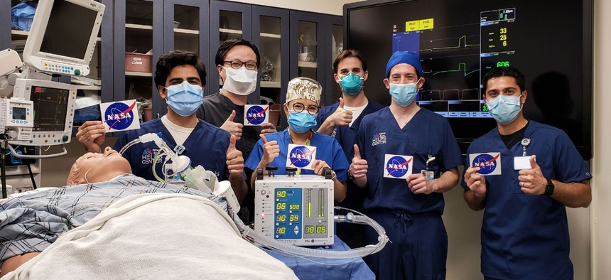 At left, doctors at the Icahn School of Medicine at Mount Sinai in New York City give a thumbs up after testing a ventilator prototype developed by NASA’s Jet Propulsion Laboratory in Southern California.
