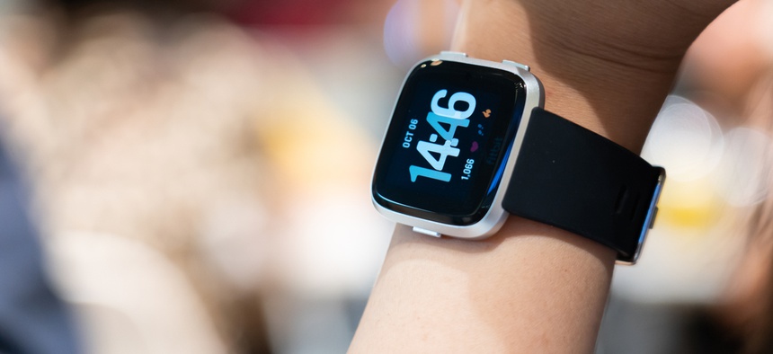 A photo of a smart watch. THANES.OP/SHUTTERSTOCK