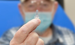 Patient Michael Nicoletti holds up the stent he helped co-design with Veterans Affairs officials.